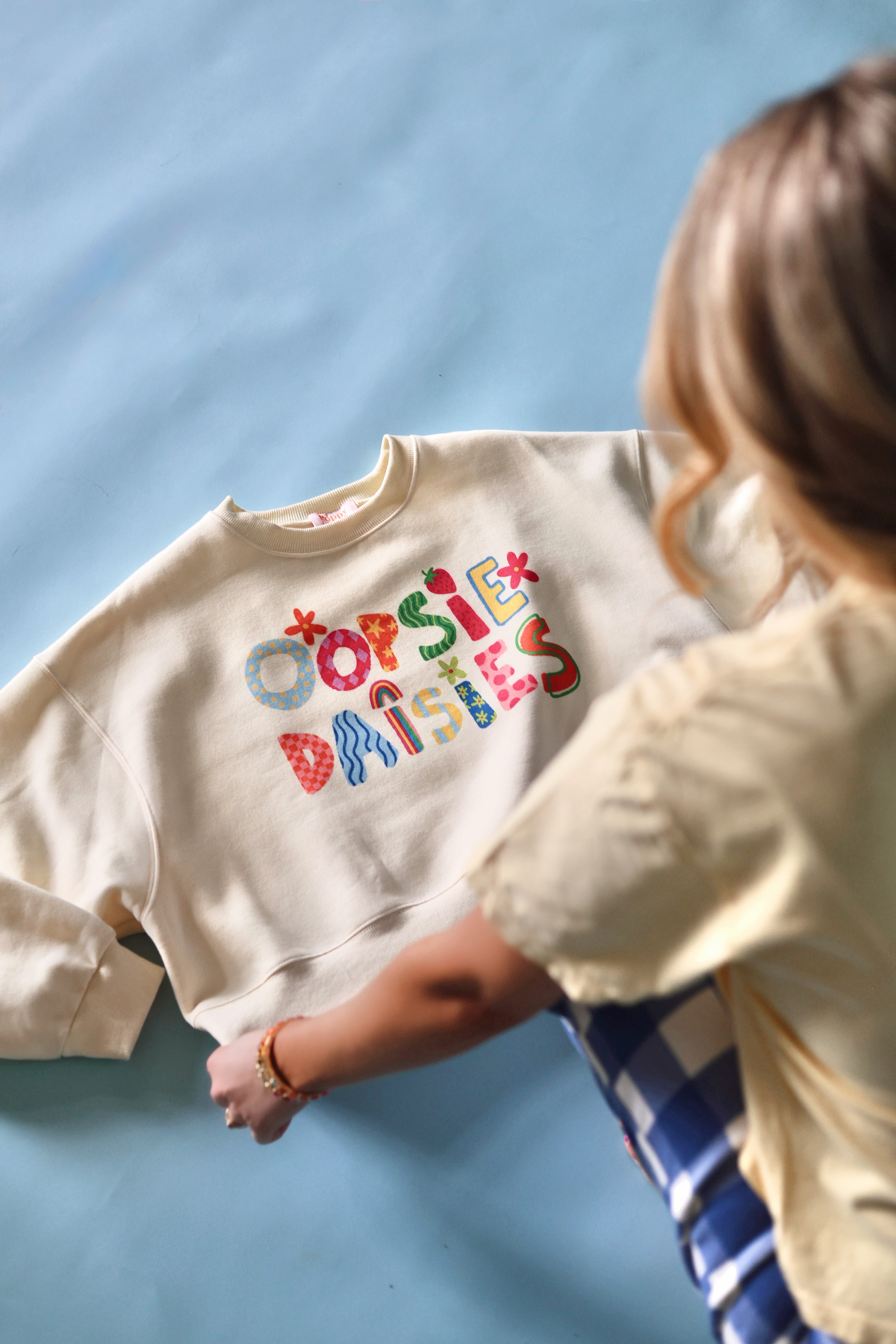 Oopsie Daisies Crop Sweatshirt