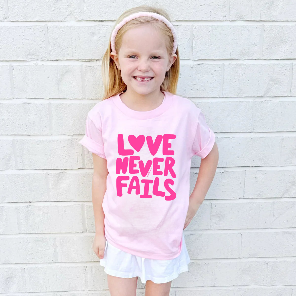 Love Never Fails Youth & Adult Tee
